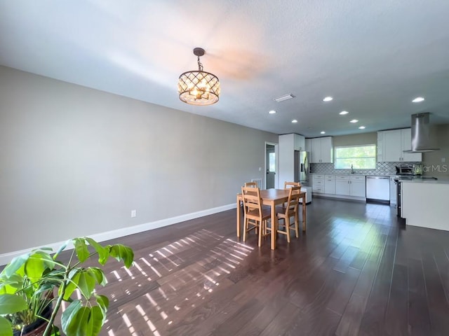 4404 Hickory Branch Ct, Brandon, FL 33511 - dining room with dark wood-style flooring, recessed lighting, and a chandelier