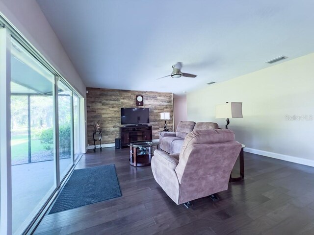 4404 Hickory Branch Ct, Brandon, FL 33511 - living room with a ceiling fan and dark wood-type flooring