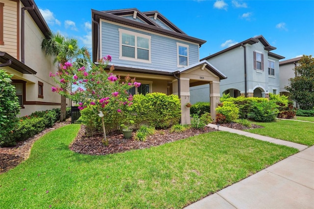 5831 Caldera Ridge Dr, Lithia, FL 33547 - view of front facade featuring a front lawn and stucco siding
