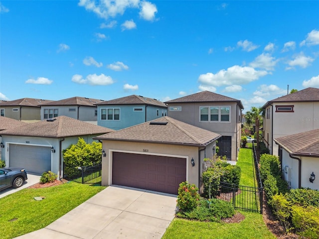 5831 Caldera Ridge Dr, Lithia, FL 33547 - view of front of home with a residential view, stucco siding, driveway, and roof with shingles