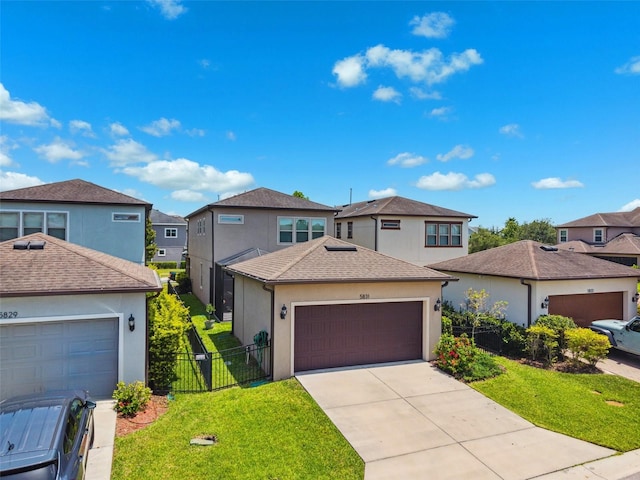5831 Caldera Ridge Dr, Lithia, FL 33547 - traditional home featuring a residential view, stucco siding, a garage, and roof with shingles