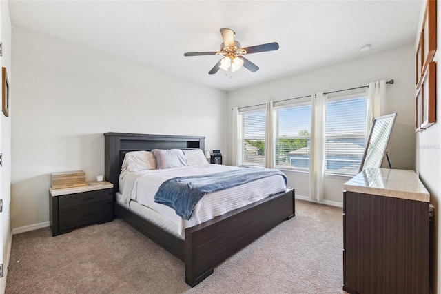 5831 Caldera Ridge Dr, Lithia, FL 33547 - bedroom with light carpet and a ceiling fan