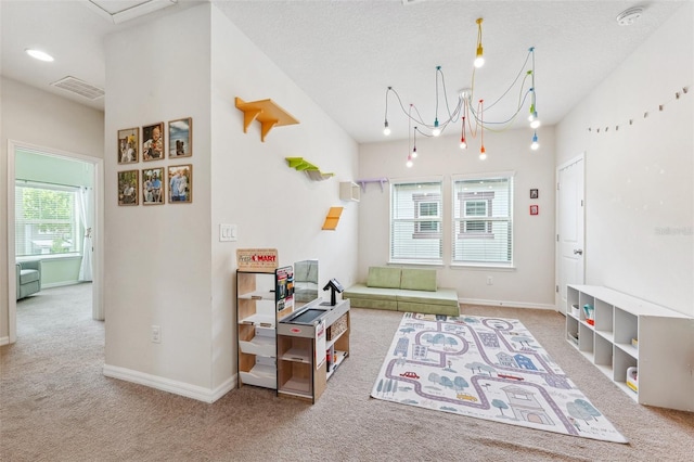 5831 Caldera Ridge Dr, Lithia, FL 33547 - sitting room featuring carpet floors and a chandelier