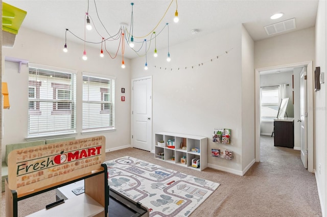 5831 Caldera Ridge Dr, Lithia, FL 33547 - game room with carpet flooring and baseboards