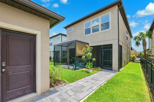 5831 Caldera Ridge Dr, Lithia, FL 33547 - entrance to property featuring stucco siding and a patio area