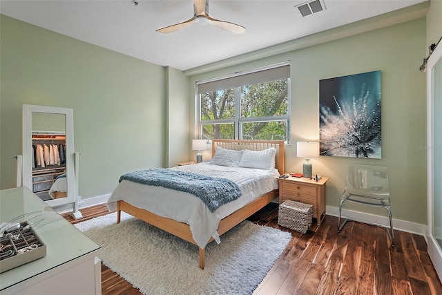 325 5th Ave S Unit 9, Saint Petersburg, FL 33701 - bedroom with dark wood finished floors and a ceiling fan