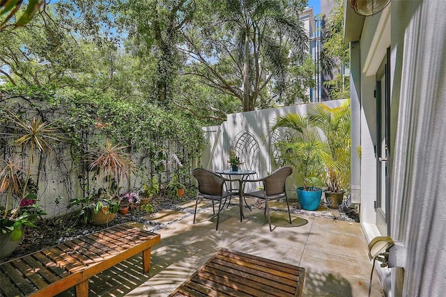 325 5th Ave S Unit 9, Saint Petersburg, FL 33701 - fenced backyard with a patio area