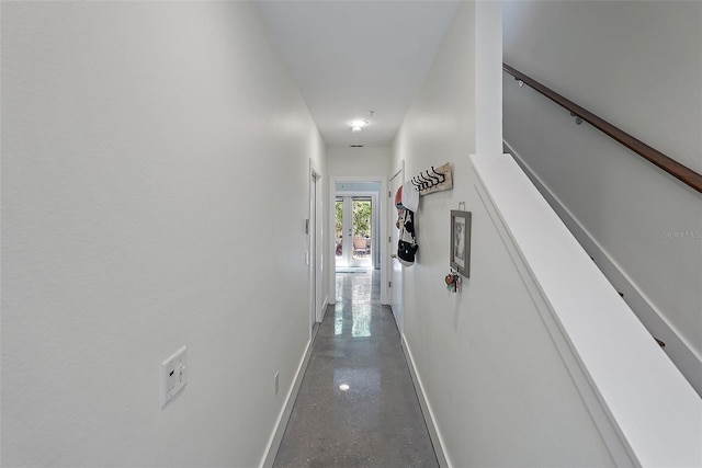 325 5th Ave S Unit 9, Saint Petersburg, FL 33701 - corridor featuring baseboards and concrete floors