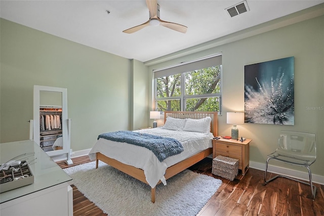 325 5th Ave S Unit 9, Saint Petersburg, FL 33701 - bedroom with wood finished floors, a ceiling fan, and a spacious closet