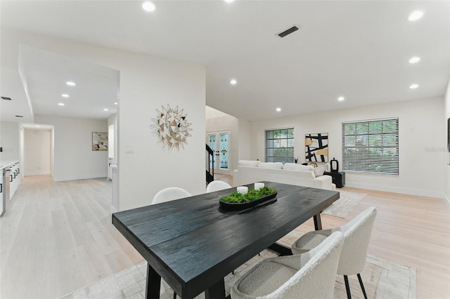 2272 Adam Ct, Palm Harbor, FL 34683 - dining space featuring light wood finished floors and recessed lighting