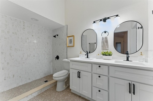 2272 Adam Ct, Palm Harbor, FL 34683 - bathroom with a tile shower, double vanity, and tile patterned floors