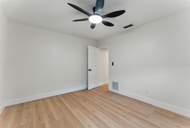 2272 Adam Ct, Palm Harbor, FL 34683 - unfurnished room with a ceiling fan and light wood finished floors