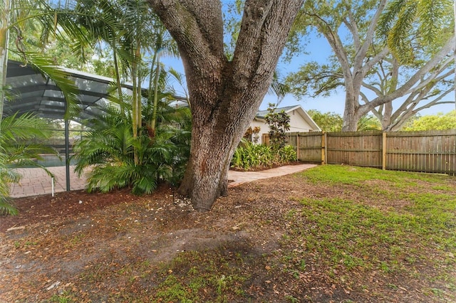 2272 Adam Ct, Palm Harbor, FL 34683 - view of yard featuring glass enclosure