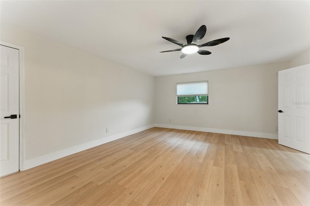 2272 Adam Ct, Palm Harbor, FL 34683 - empty room with light wood finished floors and a ceiling fan