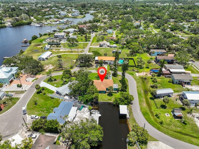 301 Carlyle Blvd, Ruskin, FL 33570 - aerial overview of property's location with nearby suburban area and a large body of water