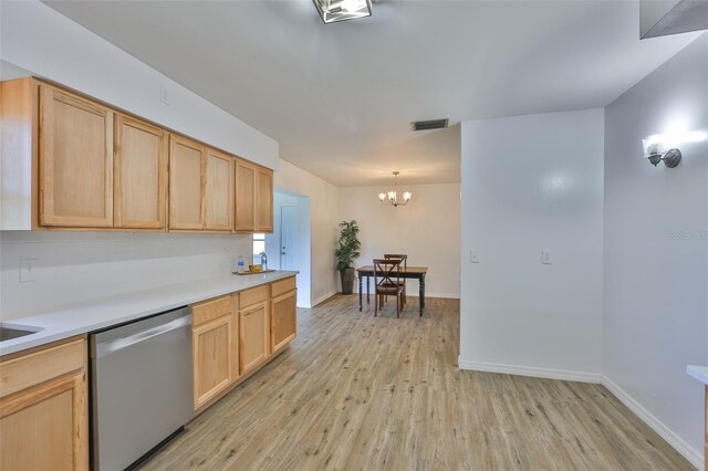 301 Carlyle Blvd, Ruskin, FL 33570 - kitchen with dishwasher, light wood-type flooring, light brown cabinets, a chandelier, and light countertops