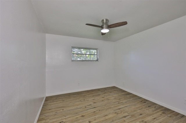 301 Carlyle Blvd, Ruskin, FL 33570 - spare room featuring wood finished floors and a ceiling fan