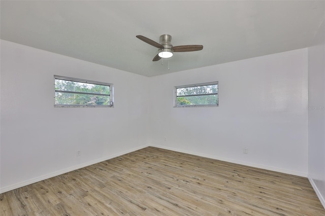 301 Carlyle Blvd, Ruskin, FL 33570 - unfurnished room featuring light wood-type flooring and ceiling fan
