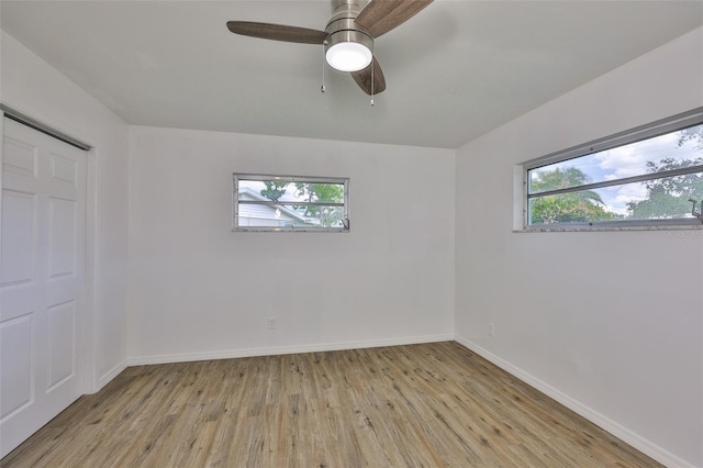 301 Carlyle Blvd, Ruskin, FL 33570 - unfurnished bedroom featuring light wood-style flooring and a ceiling fan