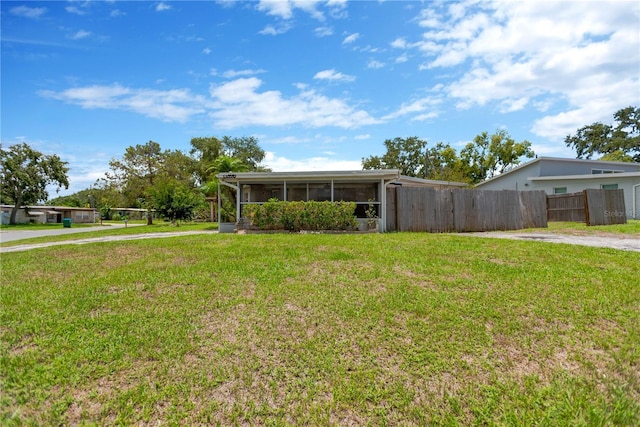 11896 104th Ln, Largo, FL 33773 - view of front of home featuring a sunroom and driveway