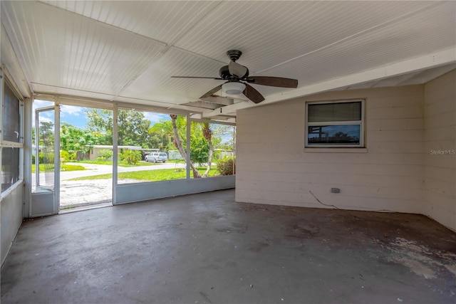 11896 104th Ln, Largo, FL 33773 - unfurnished sunroom with a ceiling fan