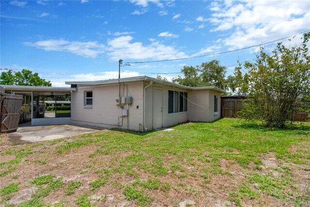 11896 104th Ln, Largo, FL 33773 - back of property with a patio area