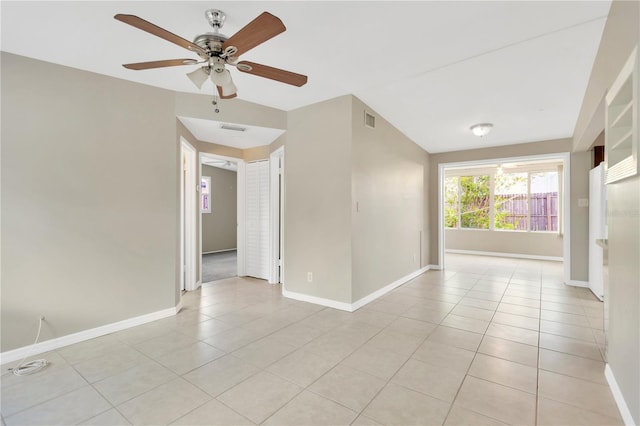 11896 104th Ln, Largo, FL 33773 - spare room with light tile patterned floors and a ceiling fan