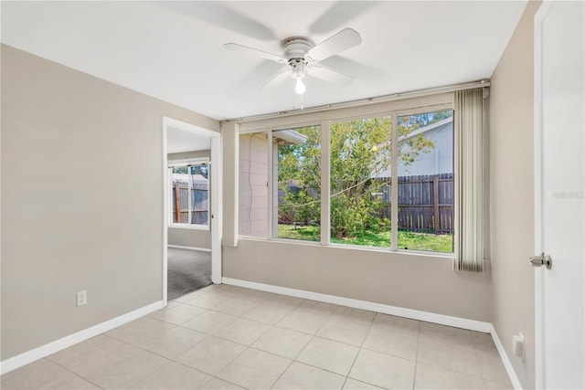 11896 104th Ln, Largo, FL 33773 - unfurnished room with a ceiling fan and light tile patterned floors