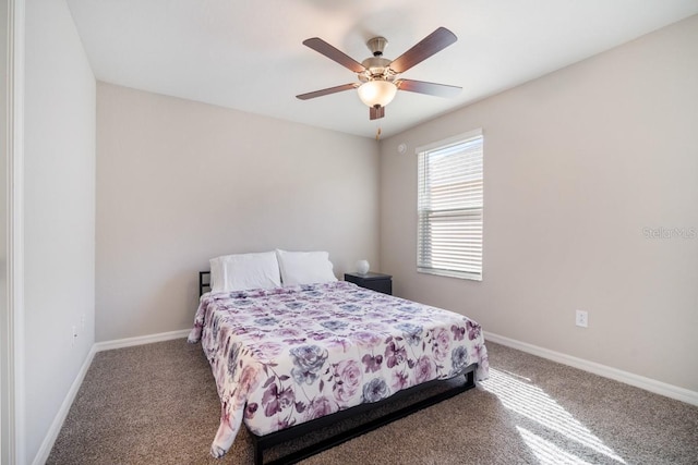 1218 Grantham Dr, Sarasota, FL 34234 - carpeted bedroom featuring baseboards and a ceiling fan