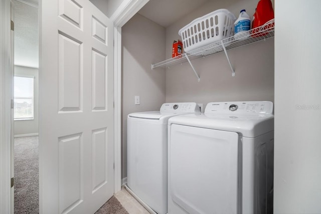 1218 Grantham Dr, Sarasota, FL 34234 - washroom with independent washer and dryer and light carpet