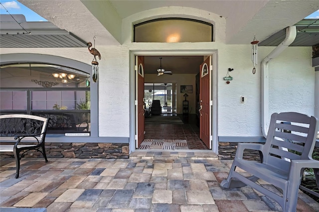 10721 N Ocean Dr, Dunnellon, FL 34434 - doorway to property featuring stucco siding