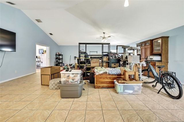10721 N Ocean Dr, Dunnellon, FL 34434 - living room featuring light tile patterned floors, a ceiling fan, and vaulted ceiling