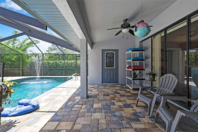 10721 N Ocean Dr, Dunnellon, FL 34434 - swimming pool featuring a patio, ceiling fan, and a lanai