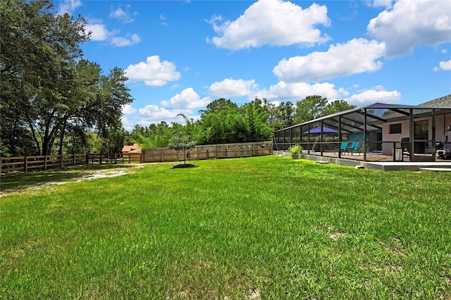 10721 N Ocean Dr, Dunnellon, FL 34434 - fenced backyard with a lanai