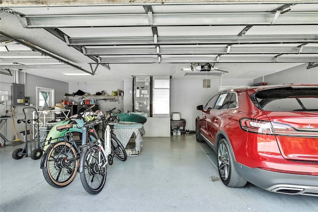 10721 N Ocean Dr, Dunnellon, FL 34434 - garage with electric panel and a garage door opener