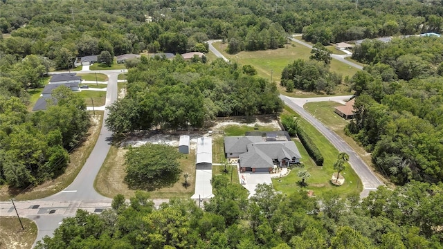10721 N Ocean Dr, Dunnellon, FL 34434 - aerial view of property and surrounding area featuring a forest