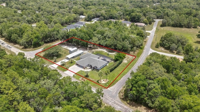 10721 N Ocean Dr, Dunnellon, FL 34434 - aerial view of property and surrounding area with a forest and property boundaries highlighted