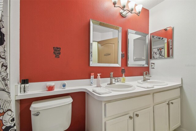 31244 Baclan Dr, Wesley Chapel, FL 33545 - bathroom with toilet and double vanity