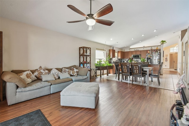 31244 Baclan Dr, Wesley Chapel, FL 33545 - living area with ceiling fan, recessed lighting, light wood-type flooring, and vaulted ceiling