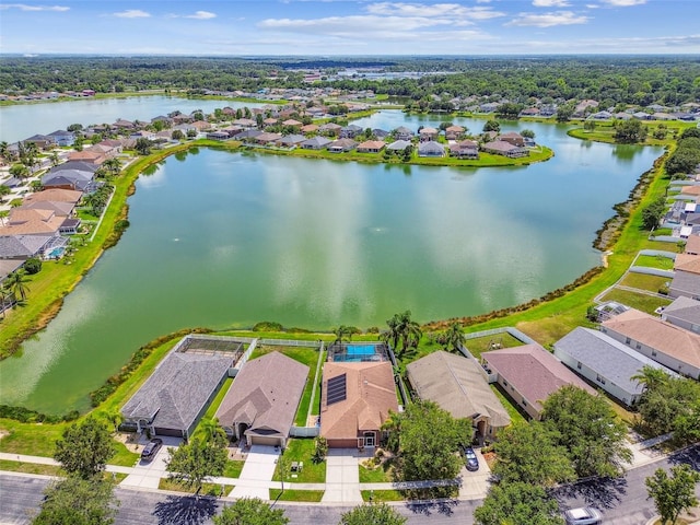31244 Baclan Dr, Wesley Chapel, FL 33545 - aerial perspective of suburban area with a nearby body of water