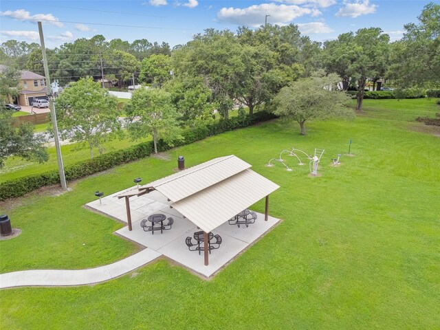 31244 Baclan Dr, Wesley Chapel, FL 33545 - surrounding community with a yard and view of scattered trees