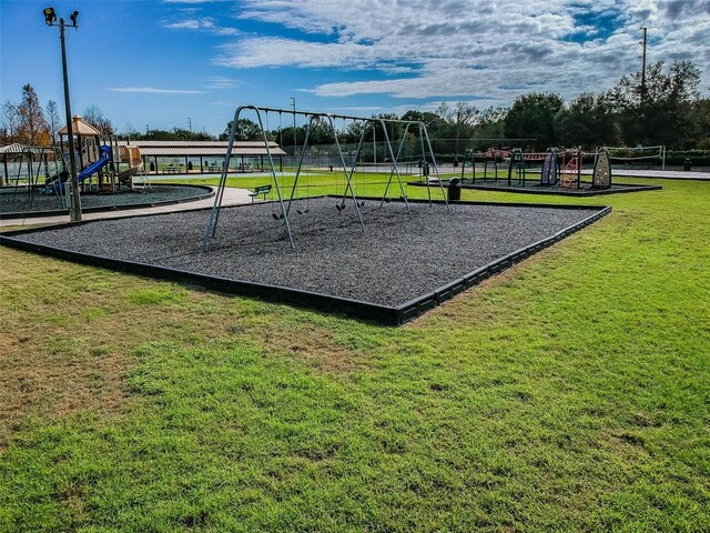 31244 Baclan Dr, Wesley Chapel, FL 33545 - community jungle gym featuring a yard
