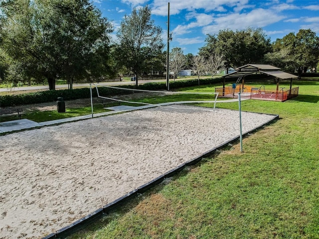 31244 Baclan Dr, Wesley Chapel, FL 33545 - surrounding community with volleyball court, a gazebo, and a lawn