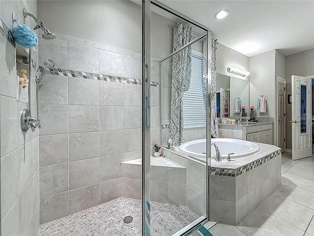 33668 Willow Point Ct, Wesley Chapel, FL 33545 - full bath featuring a stall shower, a bath, tile patterned floors, and vanity