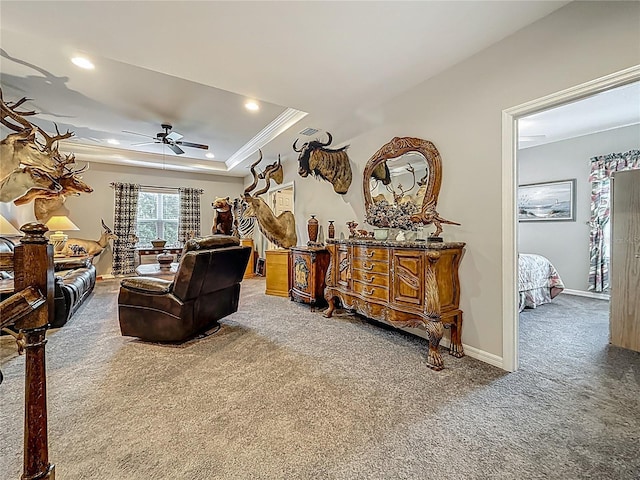 33668 Willow Point Ct, Wesley Chapel, FL 33545 - living room with carpet floors, ornamental molding, a ceiling fan, a raised ceiling, and recessed lighting
