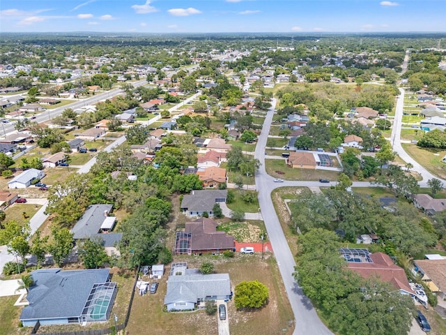 10237 Carrin Rd, Spring Hill, FL 34608 - aerial view of property and surrounding area featuring nearby suburban area