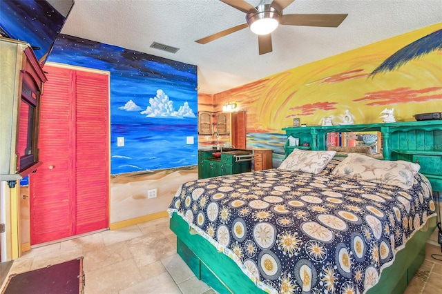 1910 Montego Ct, Oldsmar, FL 34677 - bedroom featuring a textured ceiling and ceiling fan