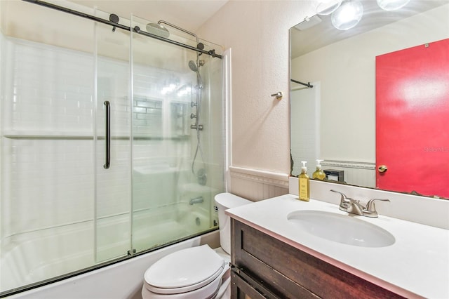 1910 Montego Ct, Oldsmar, FL 34677 - bathroom featuring bath / shower combo with glass door, vanity, and a textured wall