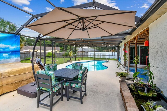 1910 Montego Ct, Oldsmar, FL 34677 - view of pool featuring a patio area, a fenced backyard, and glass enclosure