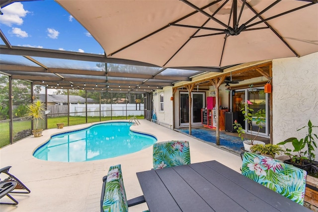 1910 Montego Ct, Oldsmar, FL 34677 - view of swimming pool with a patio area and glass enclosure